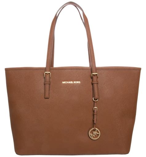 spot a fake michael kors jet tote bag|michael kors jet set duffle.